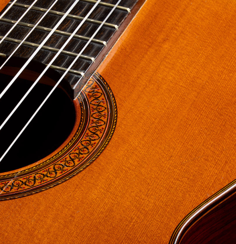 The soundboard and rosette of a 1968 Jose Ramirez "1a" classical Spanish guitar made with cedar and CSA rosewood.