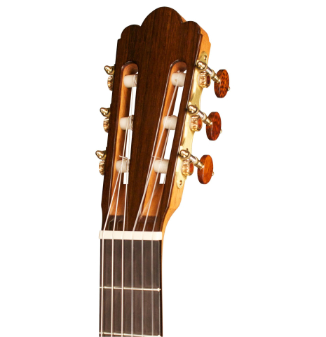 The headstock of a 2012 John Ray "1892 Torres" classical guitar made of spruce and maple