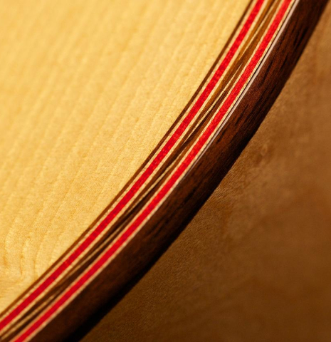 The inlays on the soundboard of a 2012 John Ray "1892 Torres" classical guitar made of spruce and maple