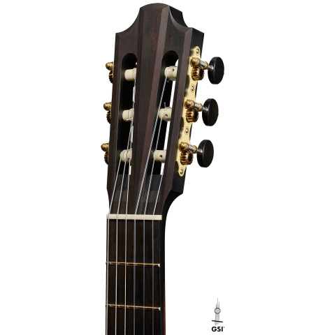 The headstock of a 2026 Richard Reynoso classical guitar made of spruce and Indian rosewood