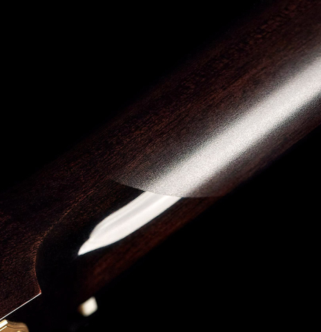 The back of the neck of a 2022 Richard Reynoso classical guitar made of spruce and pau ferro