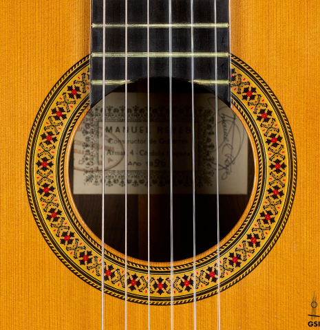 The rosette of a 1996 Manuel Reyes classical guitar made of cedar and CSA rosewood