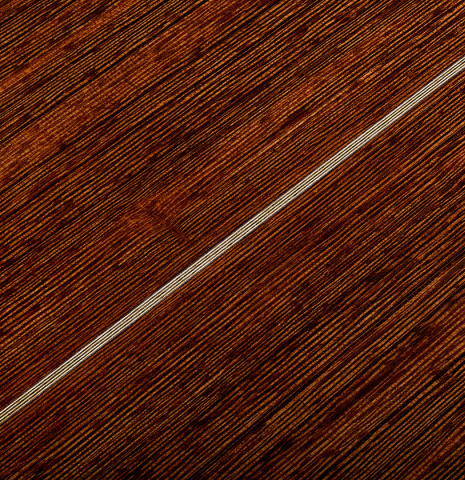 The back center seam of a 2023 Richard Reynoso classical guitar made of cedar and wenge