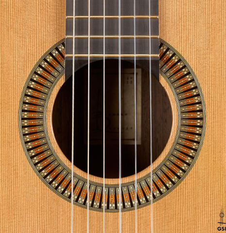 The rosette of a 2023 Richard Reynoso classical guitar made of cedar and wenge