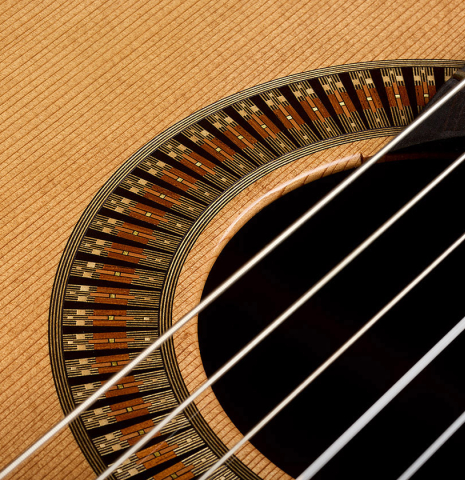 Detailed close-up of the rosette of a 2023 Richard Reynoso classical guitar made of cedar and wenge