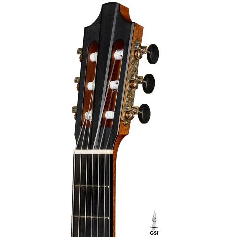 The headstock of a 2014 Richard Reynoso classical guitar made of cedar and Indian rosewood