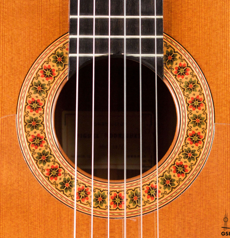 The rosette of a 1978 Miguel Rodriguez classical guitar made with redwood and Honduran rosewood