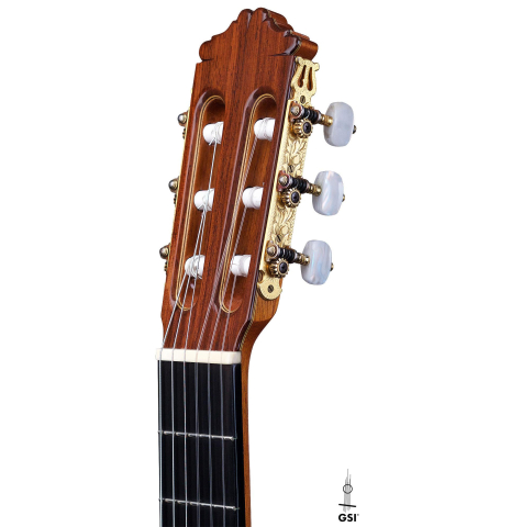 The headstock of a 1987 Miguel Rodriguez classical guitar made of spruce and Honduran rosewood