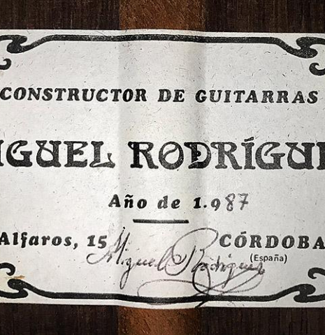 The label of a 1987 Miguel Rodriguez classical guitar made of spruce and Honduran rosewood
