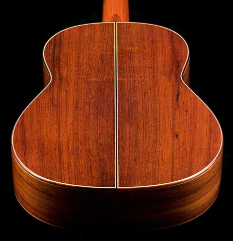 The back and sides of a 1987 Miguel Rodriguez classical guitar made of spruce and Honduran rosewood