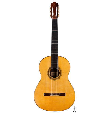 The front of a 1962 Miguel Rodriguez classical guitar on a white background
