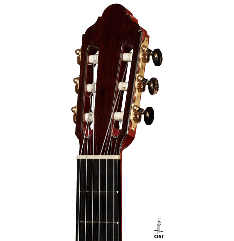 The headstock of a 2023 Jean-Noel Rohe classical guitar made of spruce and CSA rosewood on a white background