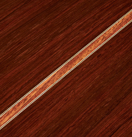 Closeup of the back center seam of a 2023 Jean-Noel Rohe classical guitar made of spruce and CSA rosewood