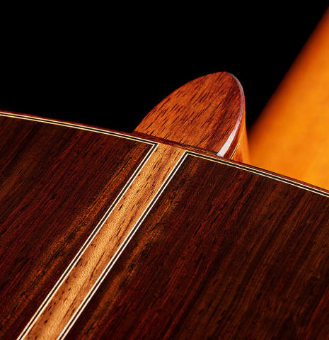 The heel, back binding and purfling of a 2024 Jean-Noel Rohe classical guitar made of spruce and CSA rosewood