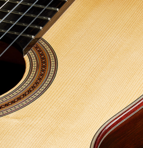 The soundboard of a 2024 Jean-Noel Rohe classical guitar made of spruce and CSA rosewood
