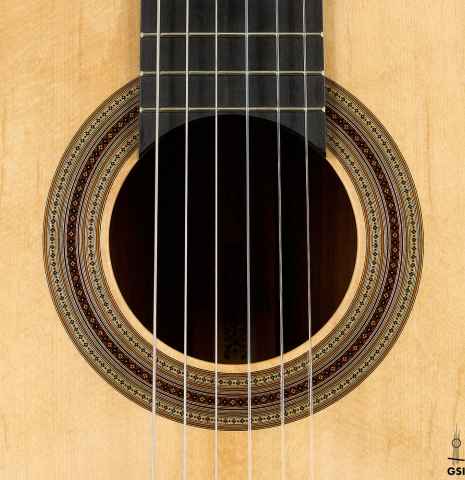 The rosette of a 2025 Jean-Noel Rohe classical guitar made of spruce and CSA rosewood