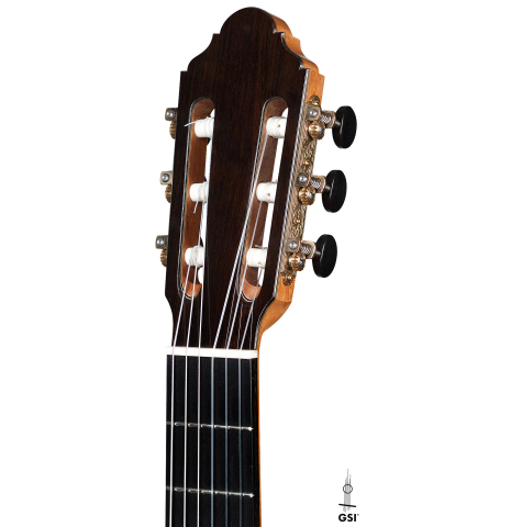 The headstock of a 2011 Jean-Noel Rohe classical guitar made of spruce and Indian rosewood