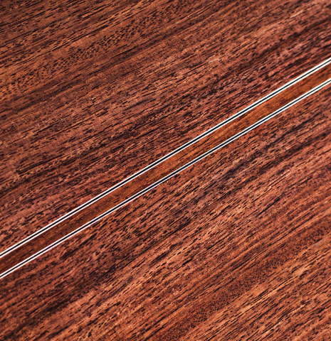 The back of a 2011 Jean-Noel Rohe classical guitar made of spruce and Indian rosewood