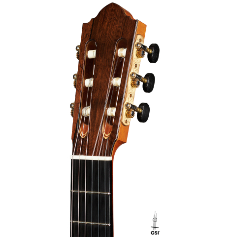 The headstock of a 2003 Jean-Noel Rohe classical guitar made of spruce and Indian rosewood