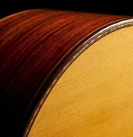 The top binding and purflings of a 2003 Jean-Noel Rohe classical guitar made of spruce and Indian rosewood