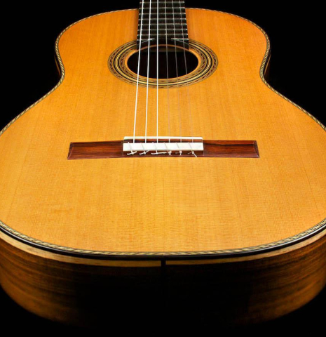 The front of a 2015 Pepe Romero "Centenario" classical guitar made with cedar soundboard and CSA rosewood back and sides