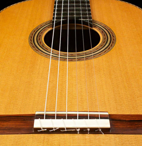 The front of a 2015 Pepe Romero &quot;Centenario&quot; classical guitar made with cedar soundboard and CSA rosewood back and sides
