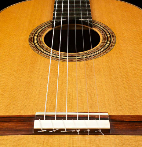 The front of a 2015 Pepe Romero "Centenario" classical guitar made with cedar soundboard and CSA rosewood back and sides