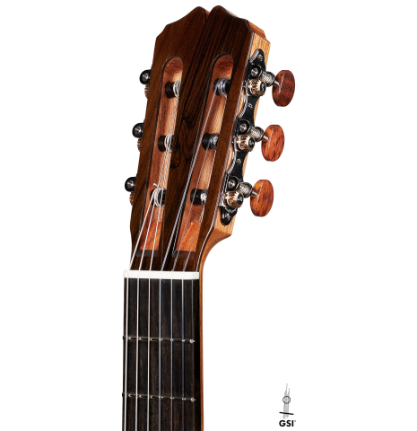 The headstock of a 2024 Pepe Romero classical guitar made of cedar and CSA rosewood