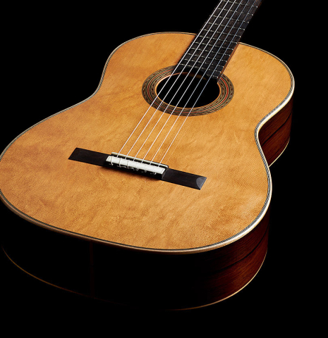 The top and sides of a 2024 Pepe Romero classical guitar made of cedar and CSA rosewood