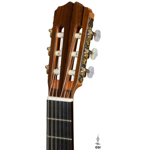 The headstock of a 2025 Pepe Romero classical guitar made of cedar and African rosewood