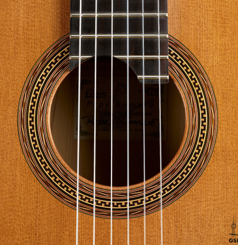 The rosette of a 2025 Pepe Romero classical guitar made of cedar and African rosewood