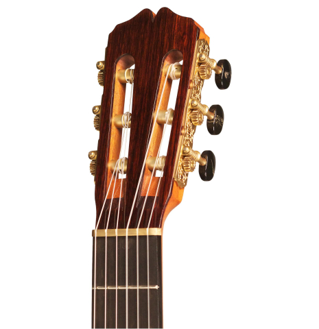 The headstock of a 2013 Pepe Romero classical guitar made of spruce and maple