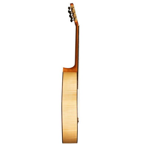 The side of a 2013 Pepe Romero classical guitar made of spruce and maple