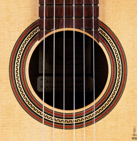 The rosette of a 2017 Pepe Romero "Centenario" classical guitar made of spruce and CSA rosewood