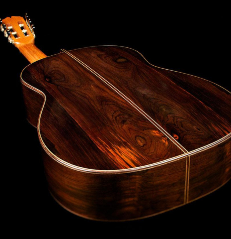 The back of a 2017 Pepe Romero &quot;Centenario&quot; classical guitar made of spruce and CSA rosewood