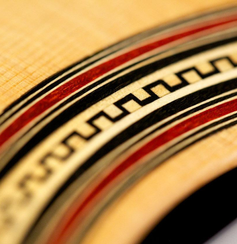 A close-up of the rosette of a 2017 Pepe Romero "Centenario" classical guitar made of spruce and CSA rosewood