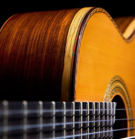 The sides, soundboard and top binding of a 2012 Pepe Romero classical guitar (ex Vicente Coves) made with cedar and CSA rosewood.