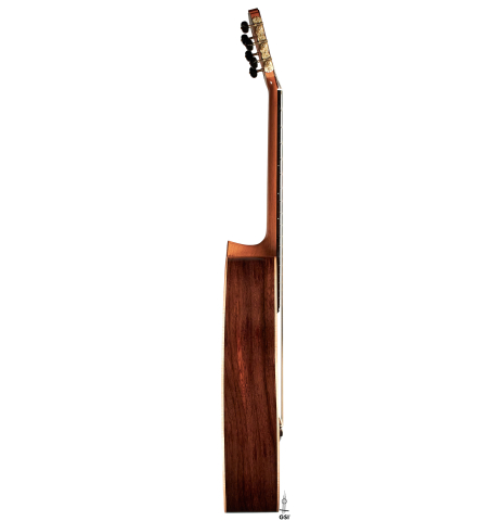The side of a 2022 Pepe Romero classical guitar made of spruce and CSA rosewood.