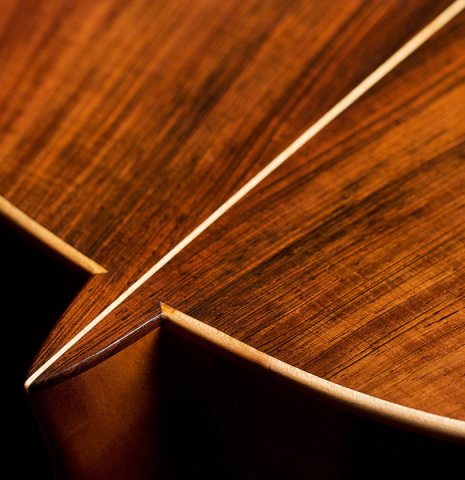 The back and heel of a 2006 Pepe Romero classical guitar made of spruce and CSA rosewood