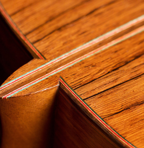 The heel and back of a 2011 Pepe Romero (ex Angel Romero) classical guitar made of cedar and African rosewood