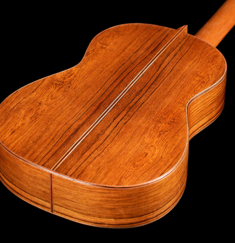 The back and sides of a 2011 Pepe Romero (ex Angel Romero) classical guitar made of cedar and African rosewood
