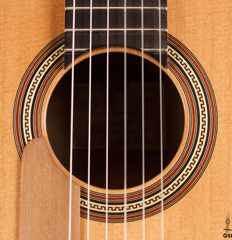 The rosette of a 2011 Pepe Romero (ex Angel Romero) classical guitar made of cedar and African rosewood