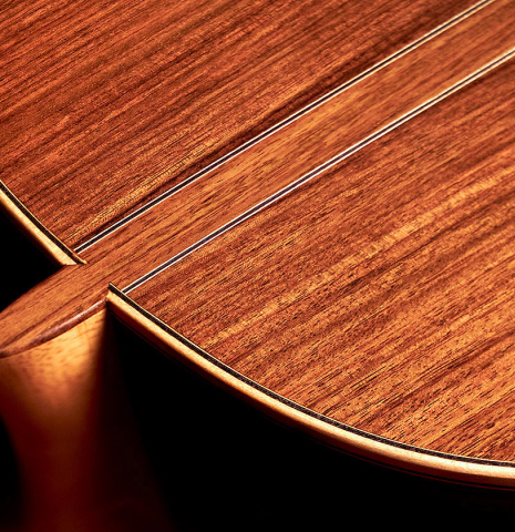 The back and heel of a 2013 Bernardo Romero #1 classical guitar made of spruce and Indian rosewood