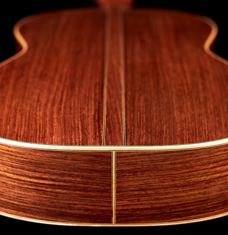 The back and sides of a 2013 Bernardo Romero #1 classical guitar made of spruce and Indian rosewood