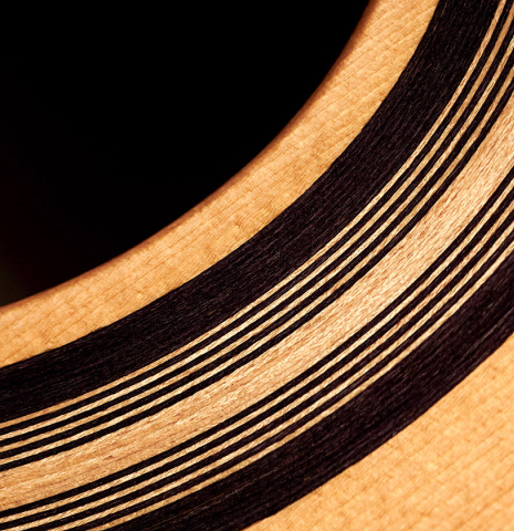The rosette of a 2013 Bernardo Romero #1 classical guitar made of spruce and Indian rosewood