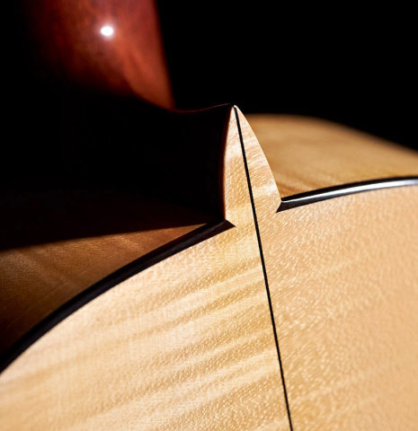 The back and heel of a 2007 Pepe Romero classical guitar made of cedar and maple