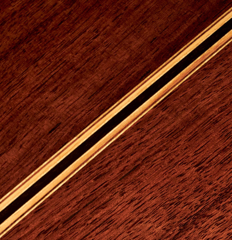 Detail of the back center seam and purfling of a 2017 Jose L. Romanillos &amp; Son "La Campanula Azul" classical guitar made with spruce and Indian rosewood.