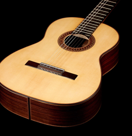 The soundboard and sides of a 2017 Jose L. Romanillos &amp; Son "La Campanula Azul" classical guitar made with spruce and Indian rosewood.