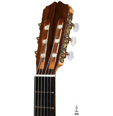 The headstock of a 2024 Pepe Romero "cutaway" classical guitar made of spruce and CSA rosewood
