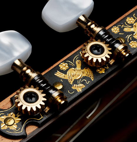 The tuning machines of a 2024 Pepe Romero "cutaway" classical guitar made of spruce and CSA rosewood